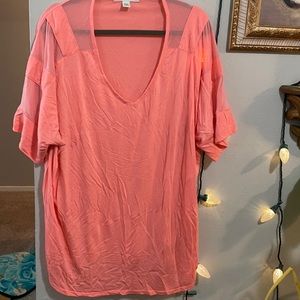 Peach colored blouse